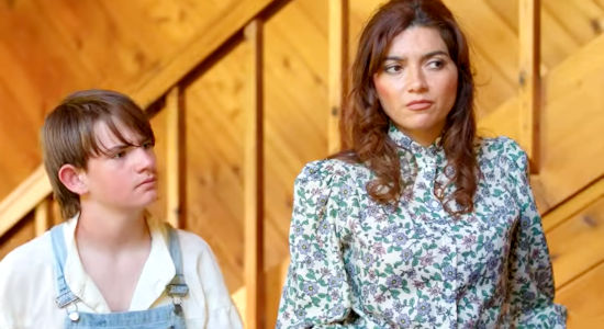 Blanca Bianco as Lola McLoughlin and her son Tommy (Tucker Werhane) being questioned by Braddock's men in Eye for an Eye (2022)