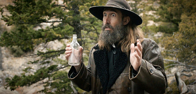 Bob Sagers as The Rev. Jerry Payne, who's stolen money from his flock to fund his liquor habit in The Counterfeit Kid (2023)