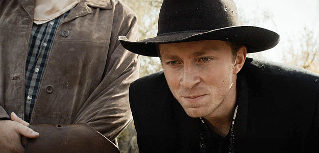 Bradley Mackay as Cooper Jennings, husband of Flatface, getting even with Jack in The Counterfeit Kid (2023)