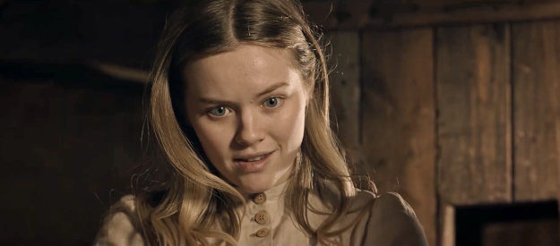 Brielle Robillard as Hester Meadows, delighted to have an edifying conversation with a men, even if he's an outlaw, in Place of Bones (2023)