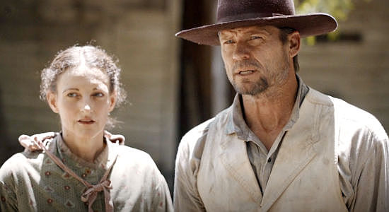 Dobie Brown as Rose Ise and Bailey Chase as her husband Henry, facing another crisis in Sod & Stubble (2025)