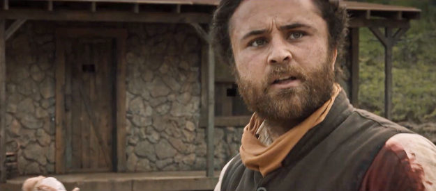 Gattlin Griffith as Cherokee Jack, realizing Pandora has given the outlaw gang a saddlebag full of books and a doll in Place of Bones (2023)