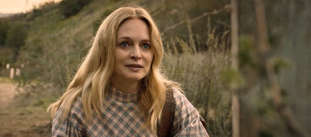 Heather Graham as Pandora Meadows, talking to her husband at his grave site in Place of Bones (2023)