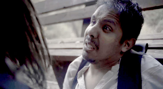 Josh Puga as Oscar Gomez, minus one ear and in danger of losing another if he doesn't tell Mia what she wants to know in Vengeance Turns (2023)