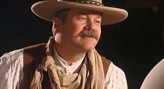 Keven Russell as Garvey, the killer McBride hires to find his runaway wife in Vengeance Trail (2006)