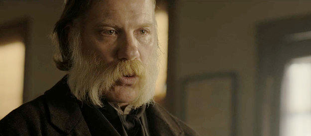 Marc Menchaca as the sheriff, tiring of hiding Constance Van Ness's dirty laundry in The Abandons (2025)