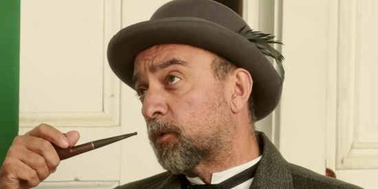 Michael Peter Bolus as Baron Eustus O'Leary, confronting an angry William Teller in Teller's Camp (2023)