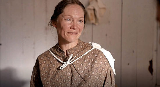 Nikki Tomlinson as Louis Haag, Chris Haag's wife and Rose's female companion in Sod & Stubble (2025)