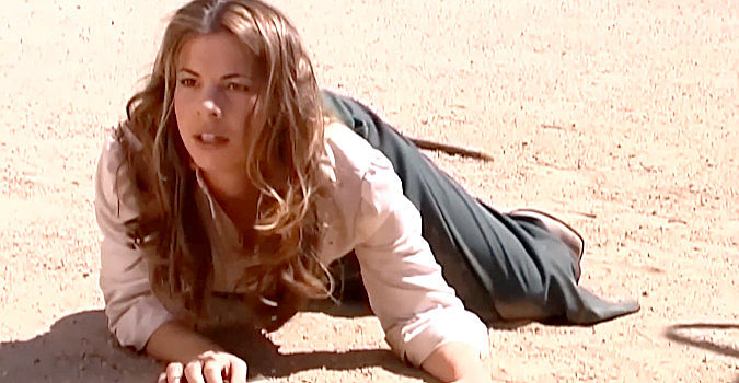 Stephanie Northrup as Annie McBride, scrambling for her life in Vengeance Trail (2006)