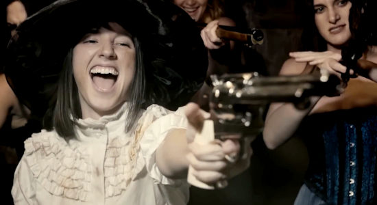 Paula Luelmo as Mia Falcon and the whores, taking out their anger on a saloon full of men in Vengeance Turns (2023)