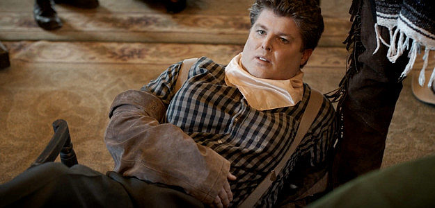 Robert Milo Andrus as Flatface Jennings, the female card player Jack offends in The Counterfeit Kid (2023)