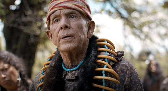 Rudy Ramos as Neharka, a Native American leader demanding food from settlers who has chased away their fame in Sod & Stubble (2025)