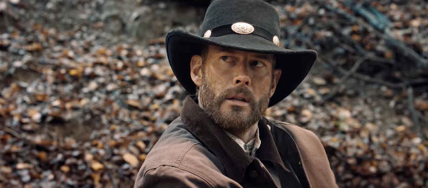 Tom Hopper as Bear John, determined to recover bank loot and avenge the death of a double-crossed brother in Place of Bones (2023)