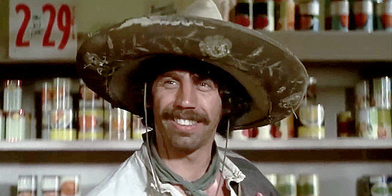 Alfonso Arau as Paco, learning to relish his new job as John McCanless's ranch hand in Scandalous John (1969)