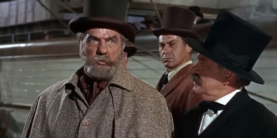 Karl Malden as Judge Higgins, forever trying to swindle others out of their gold in The Adventures of Bullwhip Griffin (1967)