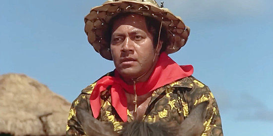 Manu Tupou as Kimo, foreman on Henrietta's potato farm in The Castaway Cowboy (1974)