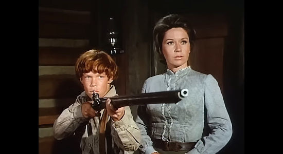 Mitch Vogel as Jamie McIver, defending his mother (Pat Crowley) in Menace on the Mountain (1970)
