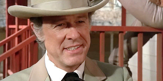 Robert Culp as the well-off businessman who keeps loaning Henrietta money in The Castaway Cowboy (1974)