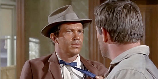 Warren Oates as Walter Charlie, a Native American court translator coming up against a diner who doesn't care for Indians in Smith! (1969)