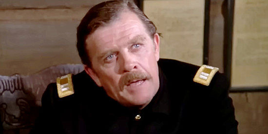 Pat Hingle as Capt. Stewart, questioning Sgt. Raines about his determination to hang Clint Keyes in One Little Indian (1973)