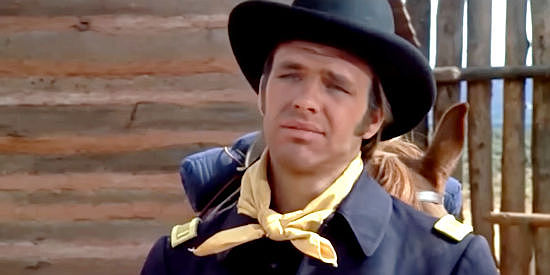 Robert Pine as Lt. Cummins, arriving at the fort with a group of needy Cheyenne woman and children in One Little Indian (1973)