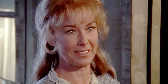 Vera Miles as Doris McIver, the widow who offers to try to find a new home for Mark in One Little Indian (1973)