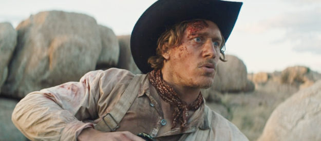 Damian Conrad-Davis as Irael Terry, spotting another man in the desert in The War Between (2025)