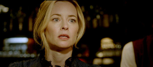 Jessica Moore as Julia Ann Smith, a lady whose photography skills might come in handy in Night of the Tommyknockers (2022)