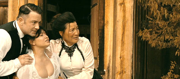 Jonathan Sadowski as Frank Ferrins comforts Sophia (Alyssa Wapanatahk) and her mom Valentina (Kimberly Guerrero) as Ed Dantes is dragged off in Cottonmouth (2025)