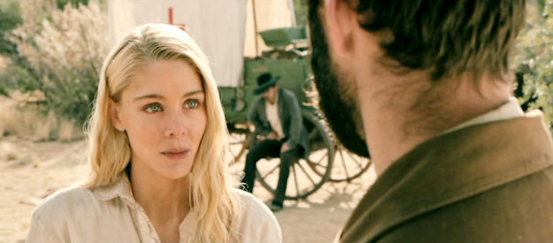 Mary Stickley as Valerie Butler clues Merrick Beckford in to coming trouble in Frontier Crucible (2025)