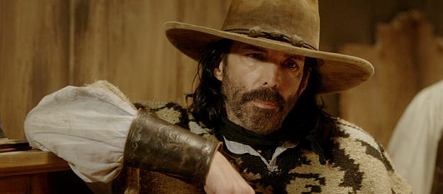 Richard Grieco as Dirk, leader of an outlaw gang that winds up battling monsters in Night of the Tommyknockers (2022)