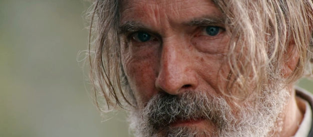Todd Berry as Adam 'The Butcher' Lynch, staring down trouble in Bad Men Must Bleed (2025)