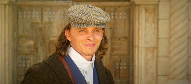 Blaine Maye as Marcus Dollar, leaving the orphanage and striking out on his own in Long Shadows (2025)