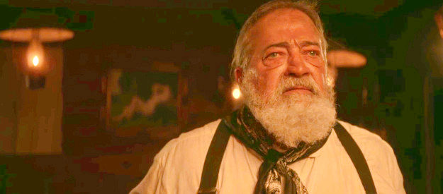 Creek Wilson as Boss Newkirk, a friend of Print Olive and uncle to the troublemakers in Killin' Jim Kelly (2025)
