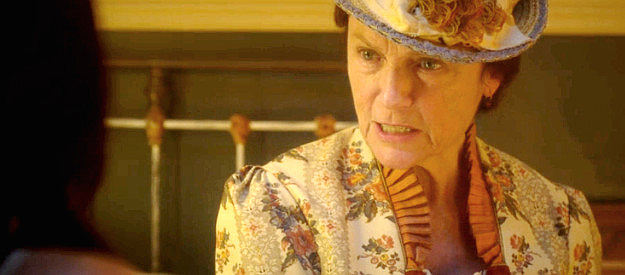 Jacqueline Bisset as Vivian Villere, painting a rosy picture of a whore's future in Long Shadows (2025)