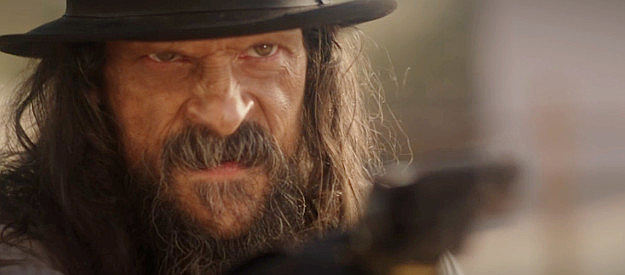 Jonathan Peacy as Kip Riley, one of the bandits who destroyed Marcus's happy childhood in Long Shadows (2025)