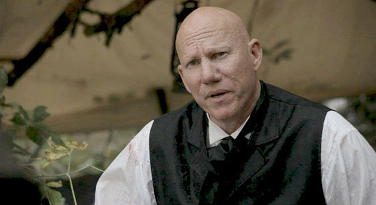 M. Sean Dowd as the hangman, trying to reason with former Sgt. Primrose in One More Time Before I Die (2023)