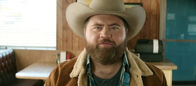Paul Walter Hauser as Lefty Ledbetter, practicing his marriage proposal in Americana (2023)