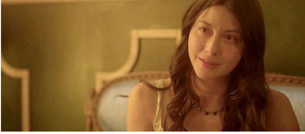 Sarah Cortez as Dulce Flores, about to be rescued from Purgatory by Marcus Dollar in Long Shadows (2025)