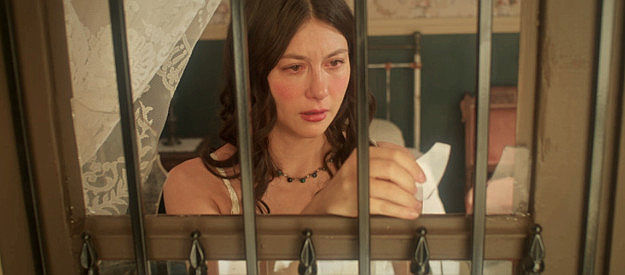 Sarah Cortez as Dulce Flores, contemplating suicide when Vivian pressures her to start whoring in Long Shadows (2025)