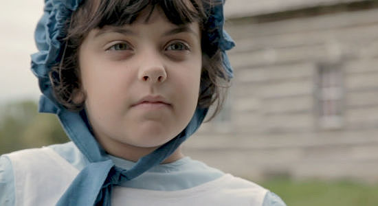 Tagan Walker as Abigail 'Sweet Pea' Harris, spotting something unusual on a trip to the chicken cooper in One More Time Before I Die (2023)