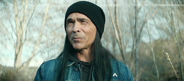 Zahn McClarnon as Ghost Eye, on a quest to secure the ghost shirt for his tribe in Americana (2023)