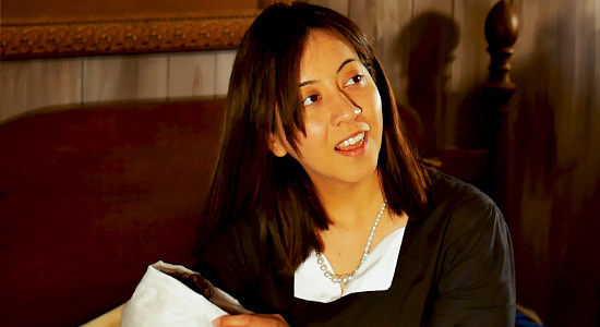 Abby Castro as Eleanor, grateful to have an adoptive daughter to call her own in Reina of the West (2022)