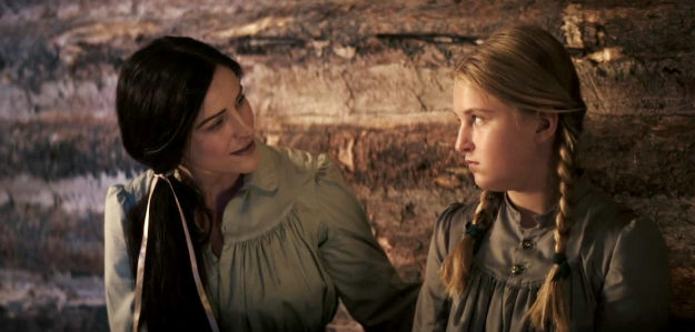 Ashley Elaine as Jessie Strong welcoming Sarah (Harper Thompson) to her new home in Where the Wind Blows (2025)