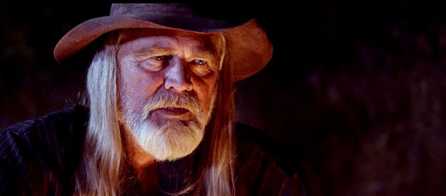 Charlie E. Motley as Banks, leader of the bounty hunters in Blood Totem (2026)
