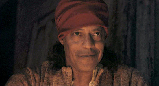 Cylk Cozard as Mr. Magian, the healer who treats Barnett after he's wounded in Marbles and Bullets (2025)