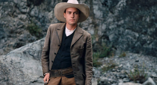 Giorgio Manenti as Johnny, Buffalo Bill's traveling companion, ready for a showdown if necessary in Heads or Tails (2025)