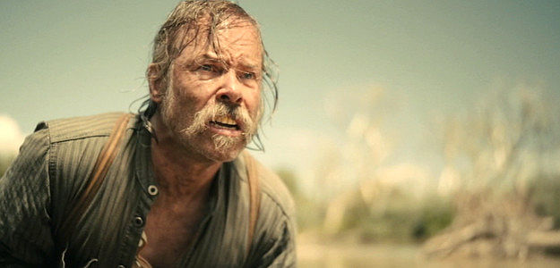 Guy Pearce as Doc Bender, trying to prevent yet another death in Killing Faith (2025)