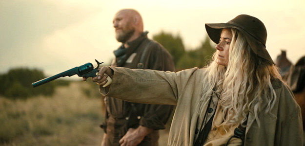Jamie Neumann as Whitey with her sidekick Gibson (Keith Jardine) about to score another kill in Killing Faith (2025)