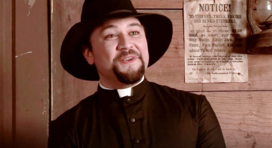 Joseph Fotinos as Father Julian, bringing his gospel of violence to Rosewood in The Magnificent Dead (2010)